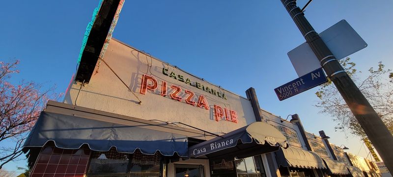 This Tiny California Pizza Joint Has Hungry Travelers Lining Up For Its Old-School Pies - Decor Hint Its Colorado Boulevard Address Sits Along Historic Route 66
