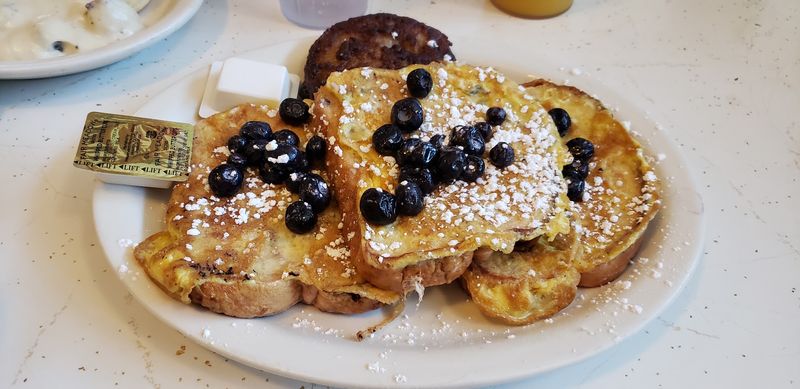This Cozy Nebraska Cafe Serves Biscuits And Gravy That Keep Locals Coming Back - Decor Hint Sweets Bring Serious Pancake Energy