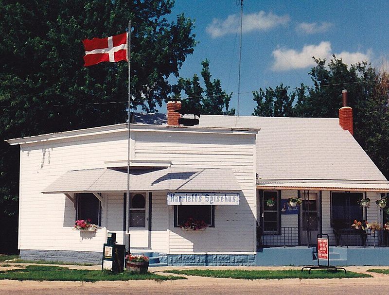 Red-And-White Details Keep The Danish Connection Visible