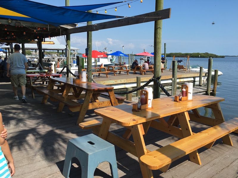 This Stunning Florida Seafood Market Is Worth The Drive In 2026 - Decor Hint No-Frills Outdoor Dining With A Waterfront View