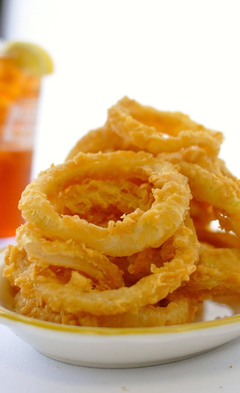 You Can Enjoy A Full Georgia Seafood Platter At This No-Frills Shack - Decor Hint The Famous Hand-Breaded Onion Rings