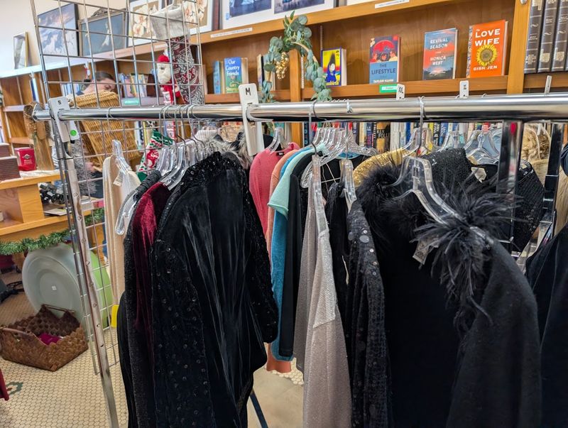 Designer Clothing Hangs Beside Everyday Wardrobe Finds