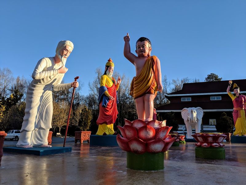This North Carolina Buddhist Temple Has A Giant Sleeping Buddha Hiding In Plain Sight - Decor Hint You Notice The Statues Before The Quiet Fully Sinks In