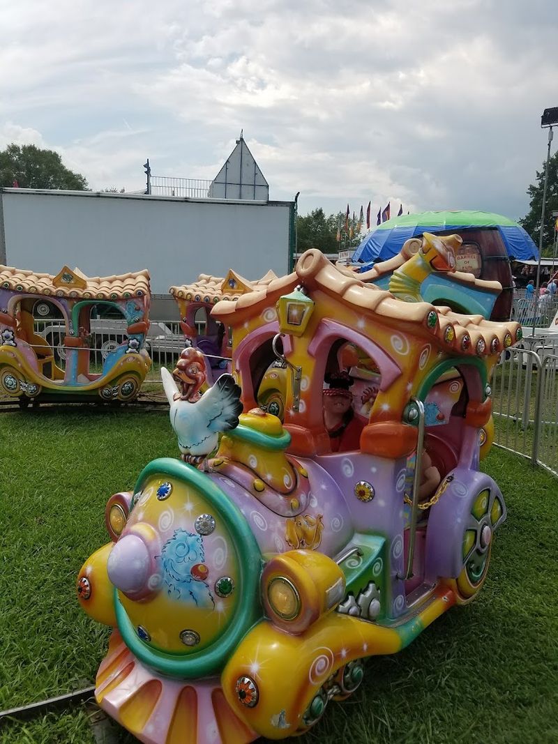 Carnival Rides That Light Up The Mountain Night