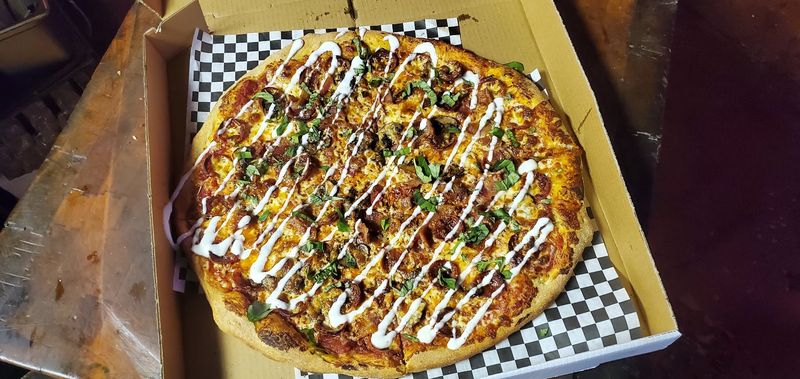 10 Underrated Nebraska Pizzerias That Belong In Your 2026 Dining Plans - Decor Hint A Flippin' Sweet Pizzeria & Italian Joint, Kearney
