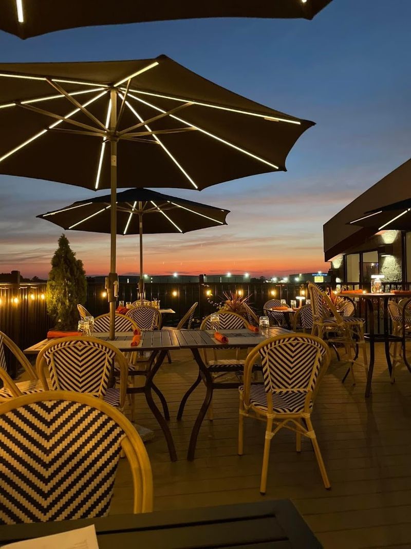 You Can Watch Planes Take Off While Dining At This Connecticut Restaurant - Decor Hint Sunset Changes The Whole View Across The Tarmac