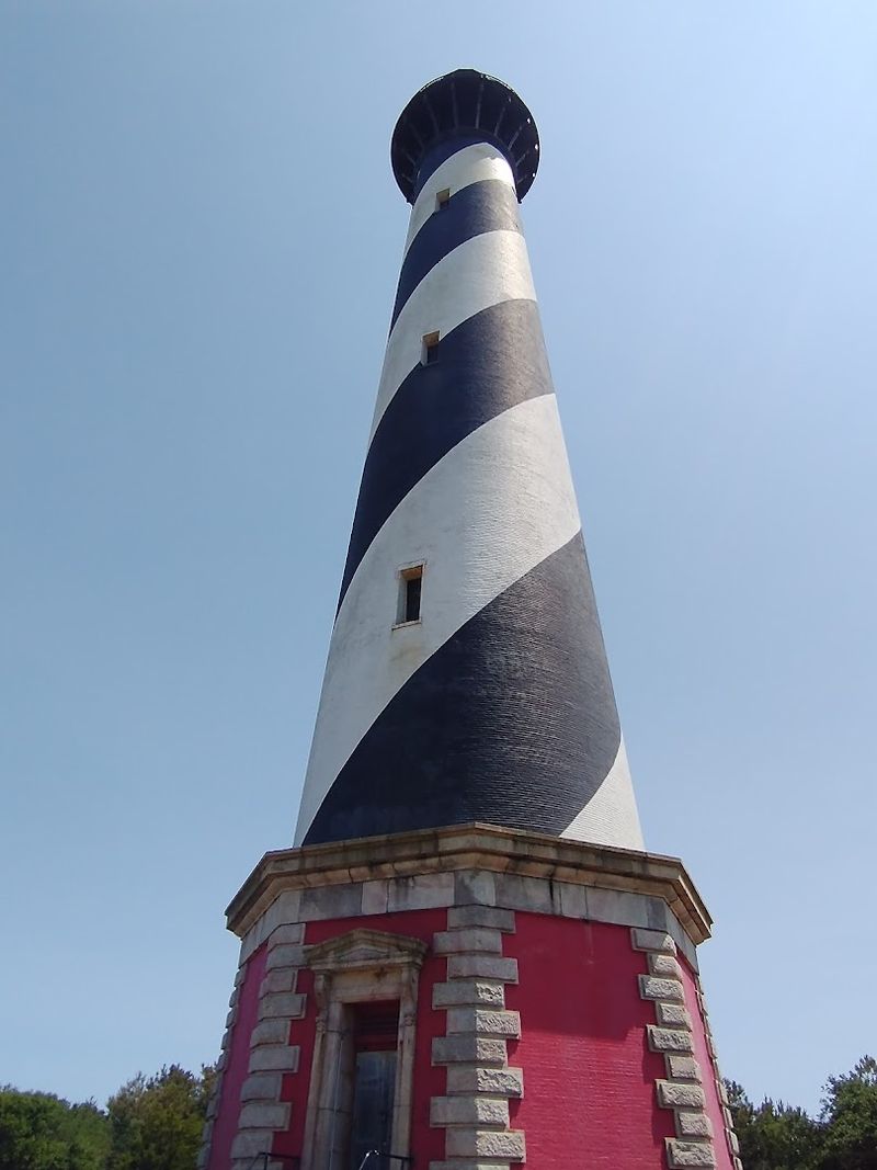 This Outer Banks Village Was Just Named America's Best Place To Spot Wild Dolphins - Decor Hint You Can Pair Dolphin Watching With Lighthouse Views