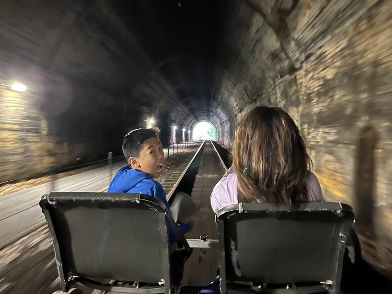 Cycling Through The 914-Foot Brush Tunnel