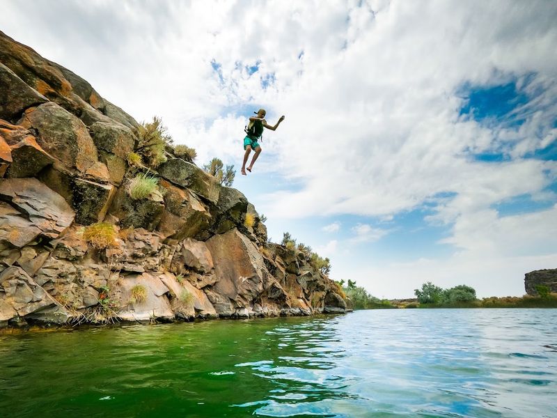Cliff Jumping Above The Falls