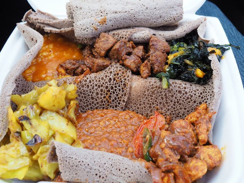 This North Carolina Food Truck Serves Ethiopian Food So Good, Fans Treat Its Location Like A Secret - Decor Hint Tell One Friend, Then Accidentally Tell Everyone