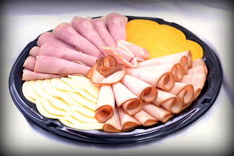 The Deli Case Holds An Impressive Meat And Cheese Selection