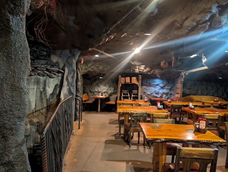 This Unique Wisconsin Restaurant Lets You Dine In A Real Mining-Themed Setting - Decor Hint History On The Walls, Warmth In The Room