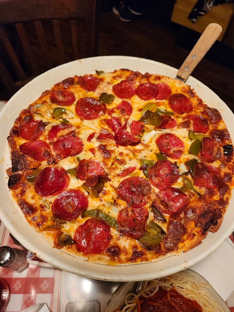 This Tiny California Pizza Joint Has Hungry Travelers Lining Up For Its Old-School Pies - Decor Hint Its Homemade Sausage Pizza Is The Signature Order