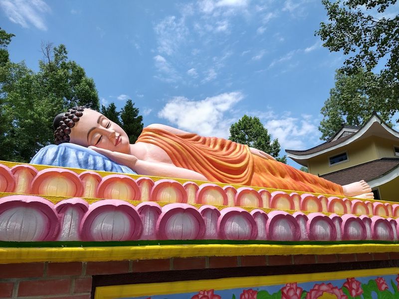 This North Carolina Buddhist Temple Has A Giant Sleeping Buddha Hiding In Plain Sight - Decor Hint Respectful Visitors Find More Than A Quick Photo Stop