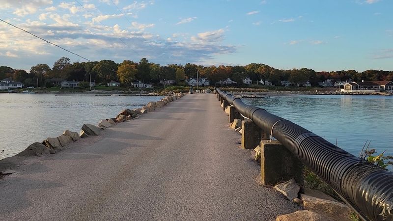 A Narrow Causeway Leads Into Island Stillness