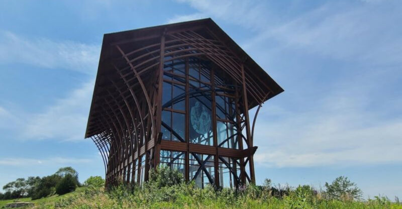 This Glass-Walled Nebraska Shrine Glows Like A Lantern Above The Prairie