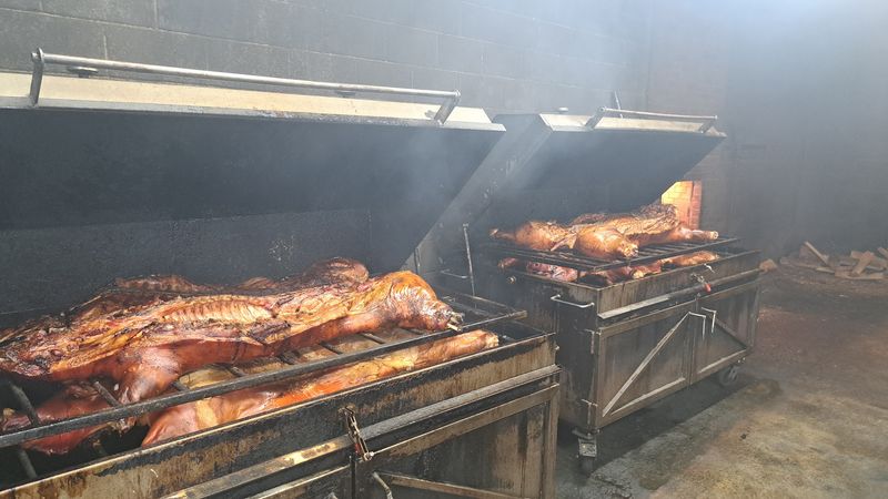 Watch Whole Hogs Cook The Traditional Wood Fired Way