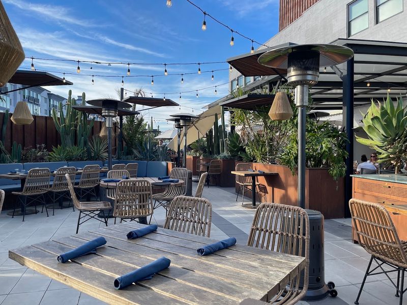 This New California Rooftop Restaurant Pairs Italian-Latin Food With Movies On A 170-Inch Screen - Decor Hint Settle Into A Rooftop Movie Night Above The Arts District
