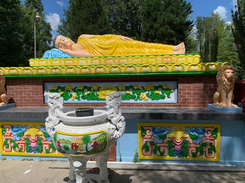 This North Carolina Buddhist Temple Has A Giant Sleeping Buddha Hiding In Plain Sight - Decor Hint The Reclining Buddha Makes The Grounds Feel Unexpected