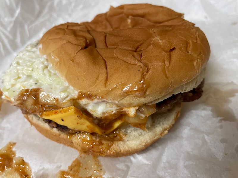 Watch Burgers Sizzle On The Flat-Top Grill