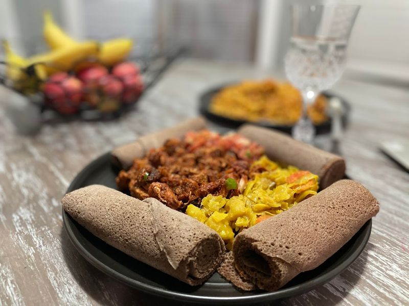 This North Carolina Food Truck Serves Ethiopian Food So Good, Fans Treat Its Location Like A Secret - Decor Hint You Get Injera First If Ethiopian Food Is New To You
