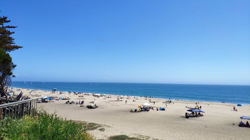 The Boardwalk Sits Directly Beside The Beach