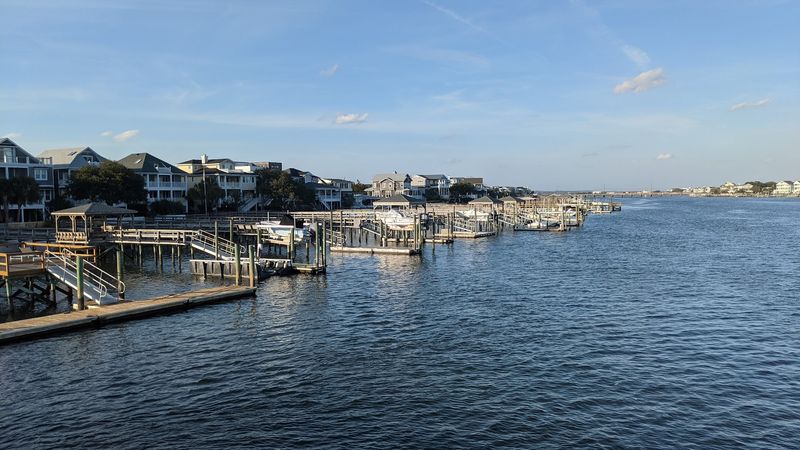 This North Carolina Beach Town Has Surfing, A Mystery Mailbox, And Fewer Crowds Than Expected - Decor Hint You Can Paddle Through Calm Water Around The Harbor And Inlets