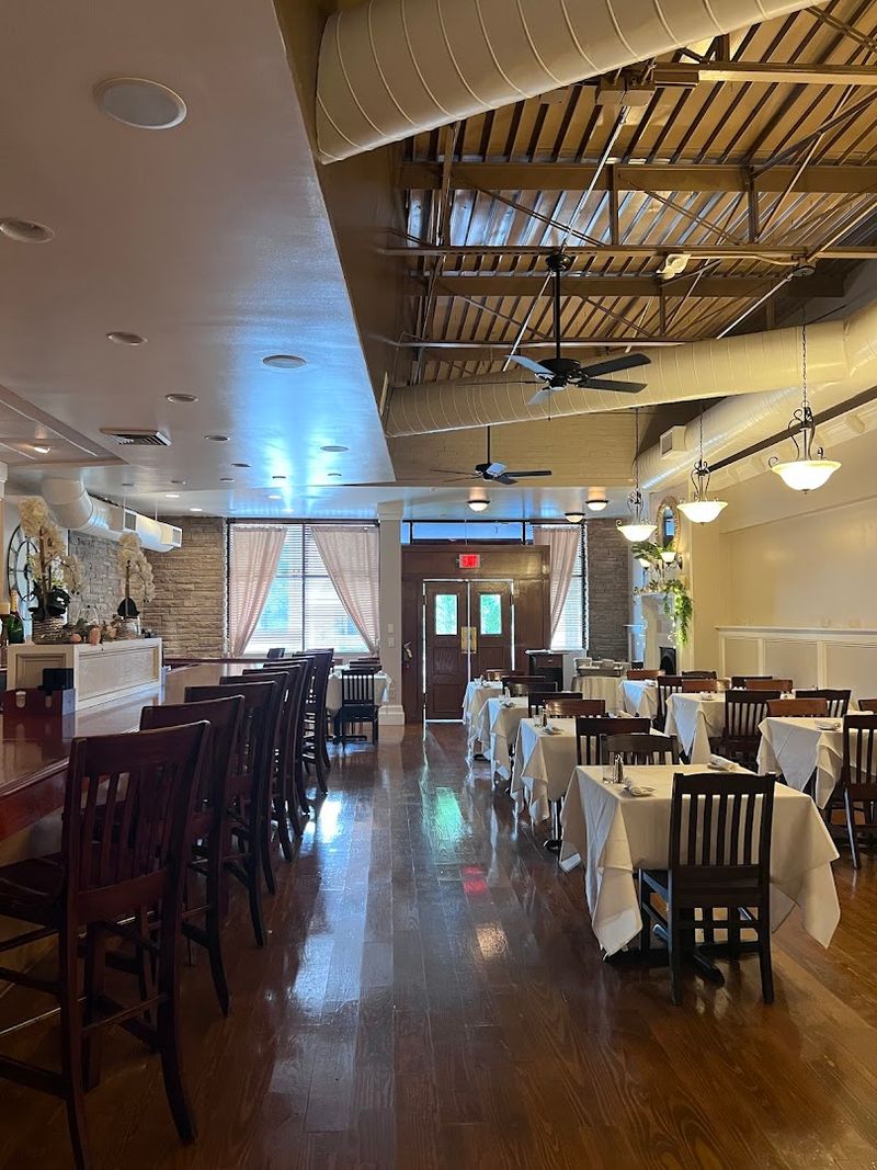 The Filet Mignon At This North Carolina Steakhouse Is So Tender, It's Worth The Drive - Decor Hint A Broad Street Table Can Make The Night Feel Special