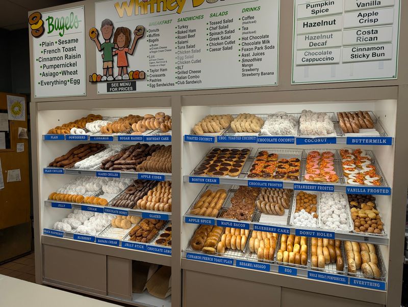 Early-Morning Baking Keeps The Donut Cases Fresh