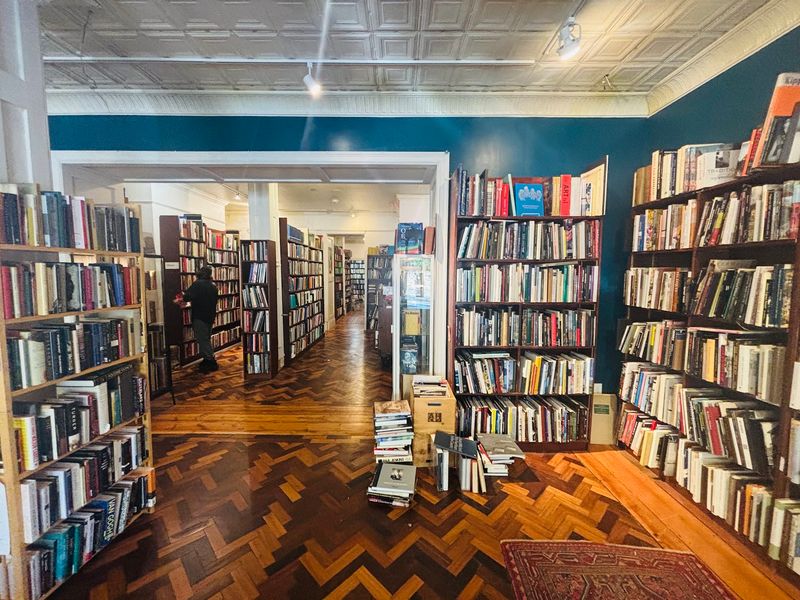 Shelves Heavy On Literature And The Arts