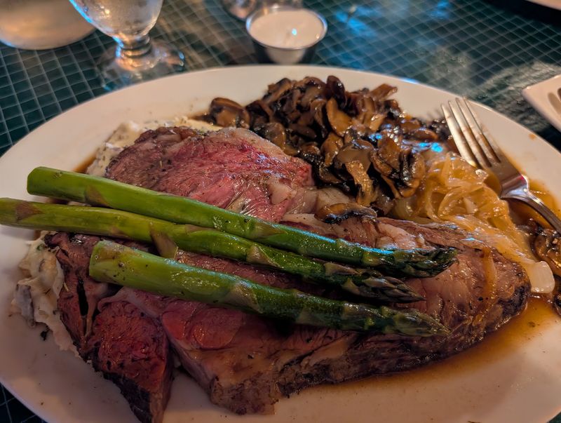 This Small Town Michigan Steakhouse Serves Massive Steaks With Gorgeous Lake Views - Decor Hint Steaks Big Enough To Make You Pause