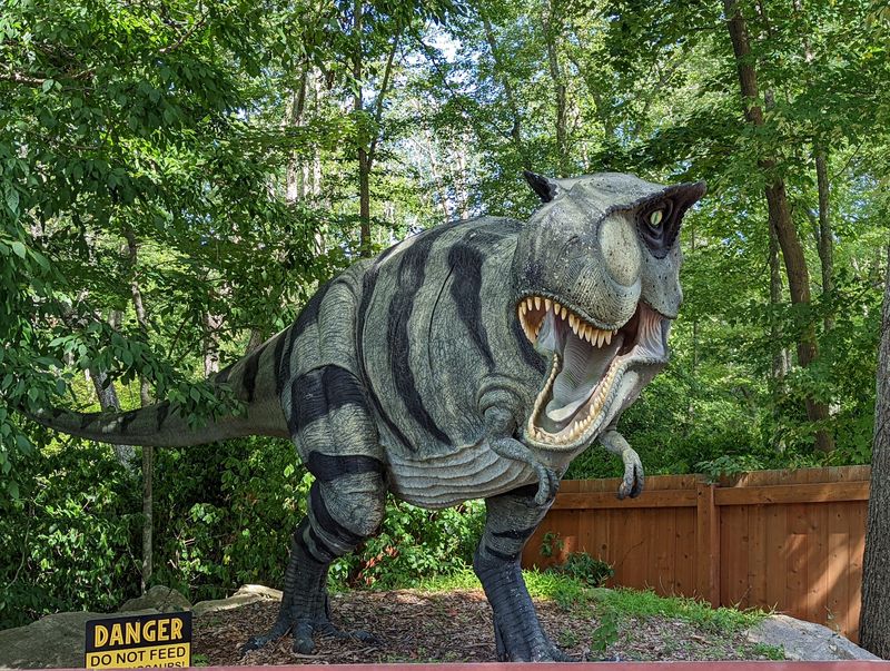 The Enchanting Connecticut Dinosaur Attraction That Feels Straight Out Of Jurassic Park - Decor Hint Roars And Movement That Bring The Dinosaurs To Life