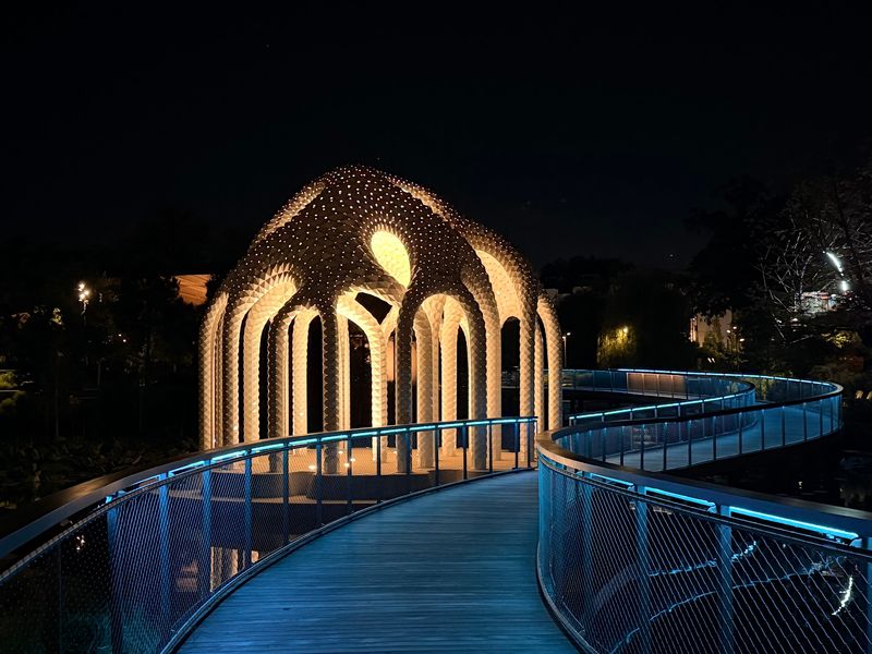 This 17-Foot-High North Carolina Skywalk Turns Into A Glowing Light Tunnel After Dark - Decor Hint Families, Couples, And Evening Walkers All Seem To End Up Here Eventually