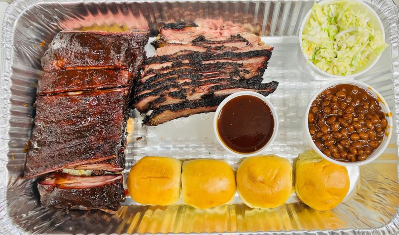 The Slow-Smoked Brisket Gets Sliced Fresh To Order