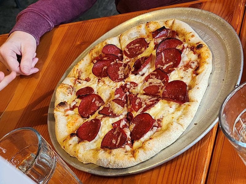 This Idaho Bakery Hides Inside A 1920s Service Station With An Old Safe Turned Into An Oven - Decor Hint Wood-Fired Pizza Adds A Savory Side To A Place Better Known For Sweets
