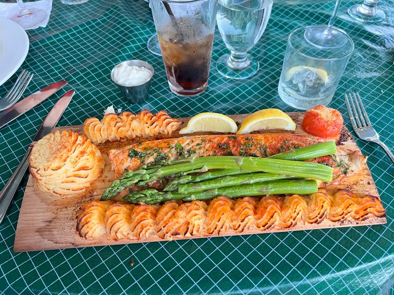 This Small Town Michigan Steakhouse Serves Massive Steaks With Gorgeous Lake Views - Decor Hint Sides That Earn Their Spot