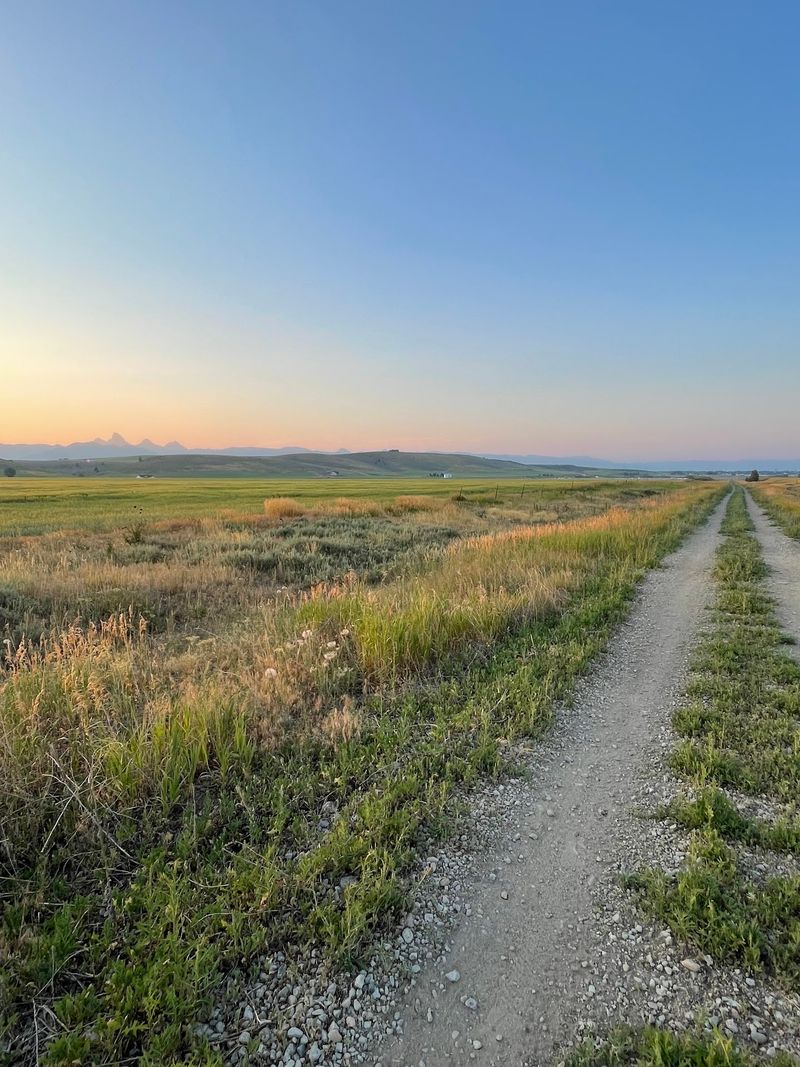 This 30-Mile Idaho Rail Trail Rolls Past Historic Trestles, Open Farmland, And Jaw-Dropping Teton Views - Decor Hint Watch The Landscape Shift Between Fields, Aspen Groves, And Riparian Stretches