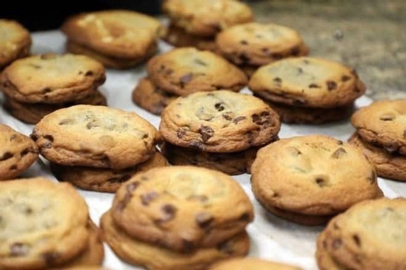 Two Fresh-Baked Cookies Wrapped Around Vanilla Ice Cream