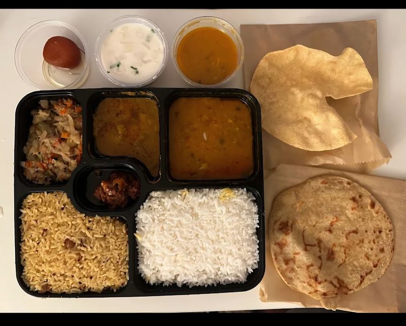 Spice Up Your Week At This Illinois Indian Kitchen Locals Are Talking About - Decor Hint Dosas That Arrive Bigger Than The Plate
