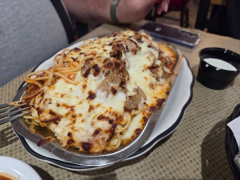 Baked Spaghetti Under Melted Cheese