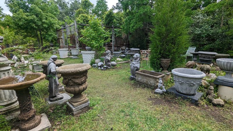 A Garden Yard Filled With Iron And Stone