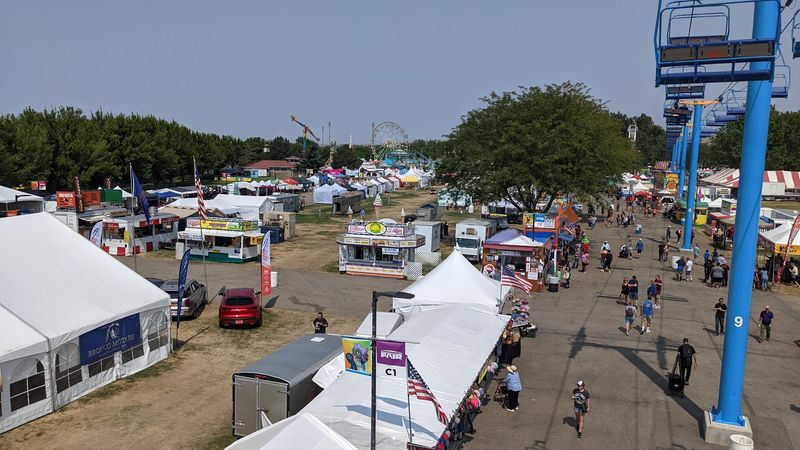Browse Rows Of Vendors Before The Evening Crowds Build