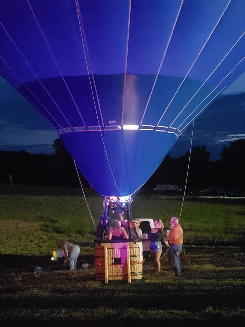 Evening Balloon Glow Turns The Field Into Lanterns