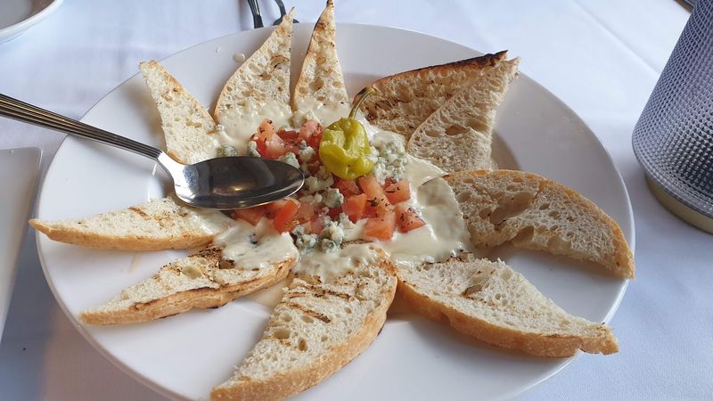 Bread That Vanishes Before The Entrees Land