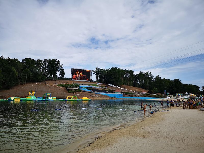 This Hidden Tropical Escape In Georgia Will Make You Feel Like You're In The Caribbean - Decor Hint The Aquatic Adventure Inflatable Obstacle Course