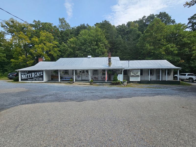 A White Clapboard Store With A Kitchen Inside