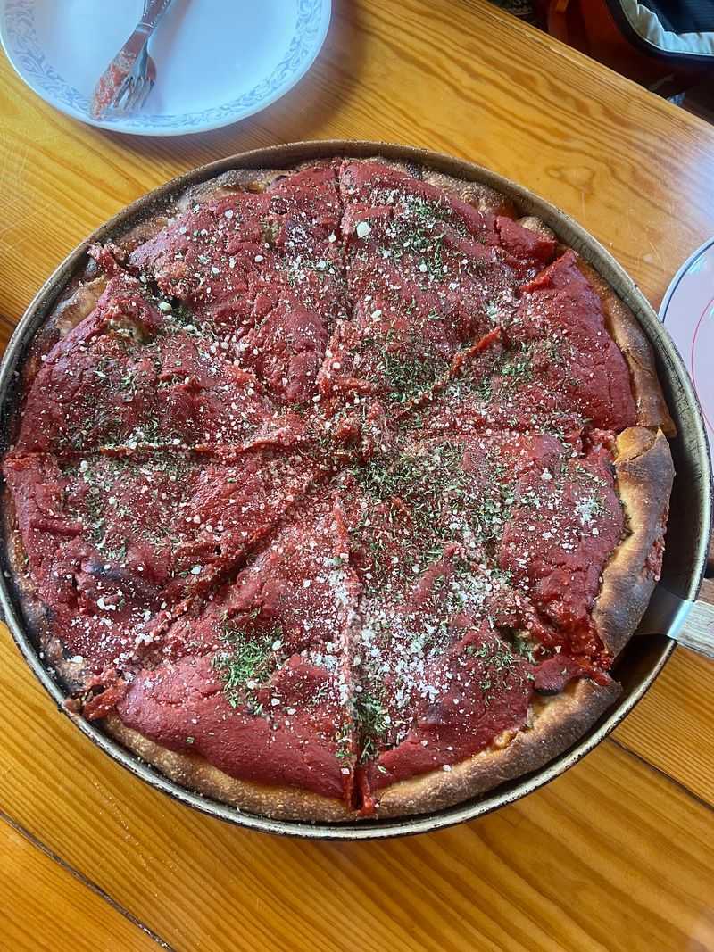 This Hidden Northern Wisconsin Pizzeria Is So Good Folks Drive Three Hours Just For A Slice - Decor Hint Three Crusts And Countless Ways To Order