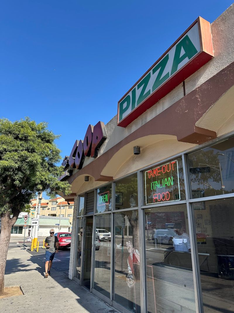 Visit The Coop Pizza At 10006 National Boulevard In Los Angeles