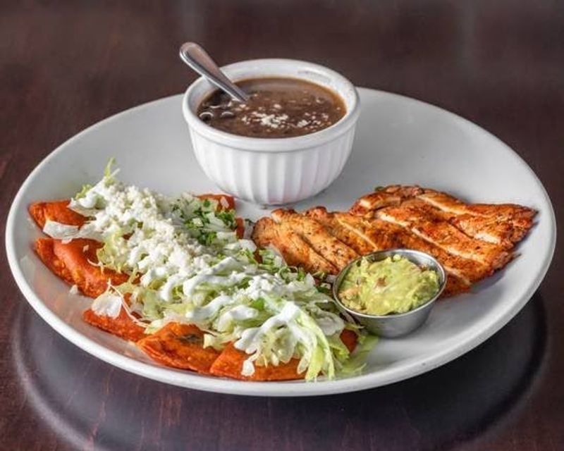 Locals Keep Returning To This Connecticut Mexican Restaurant For Its Cheesy Enchiladas - Decor Hint A Menu Made For Sharing And Sampling