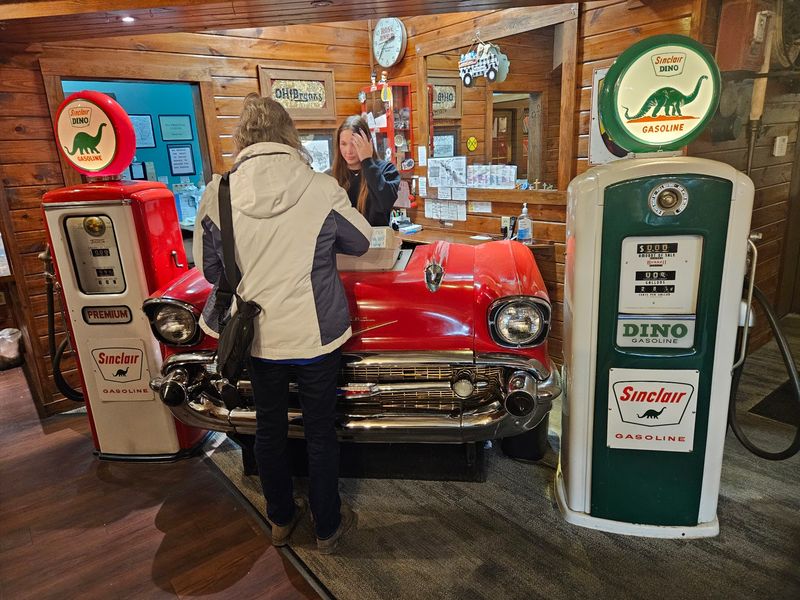 This Classic Alabama Steakhouse Is Still Known For A Salad Bar Locals Love - Decor Hint Vintage Gas Pumps And A 1957 Chevy Checkout